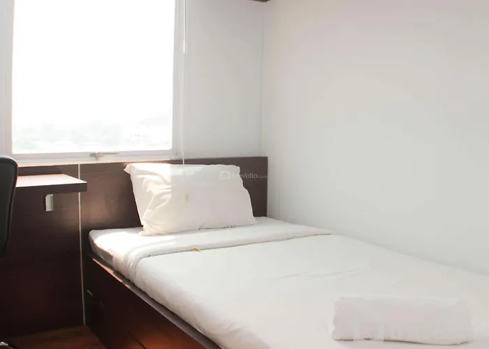 Homey And Minimalist 2Br At Patraland Urbano Apartment By Travelio